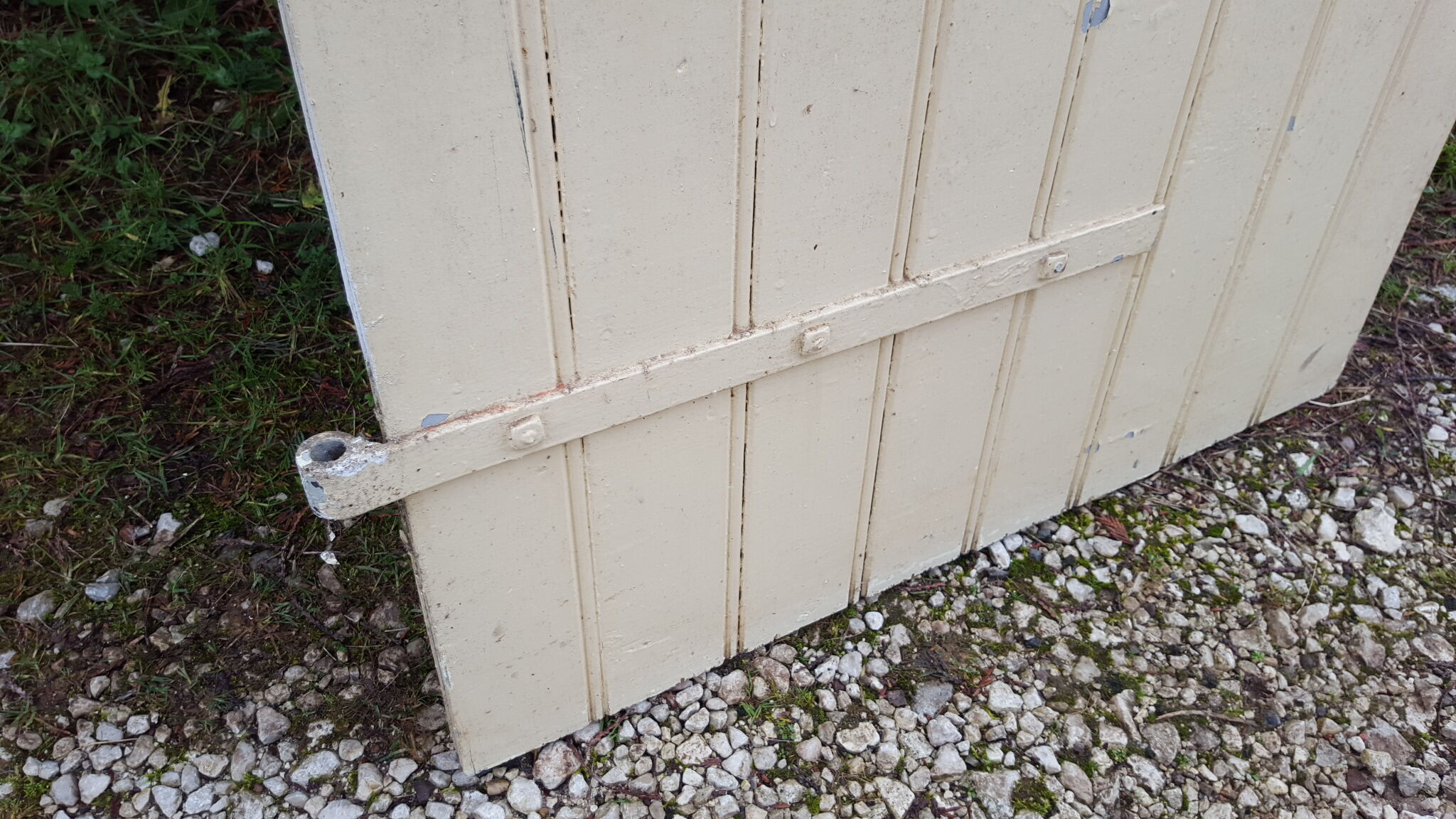 Old door in cream lacquered wood