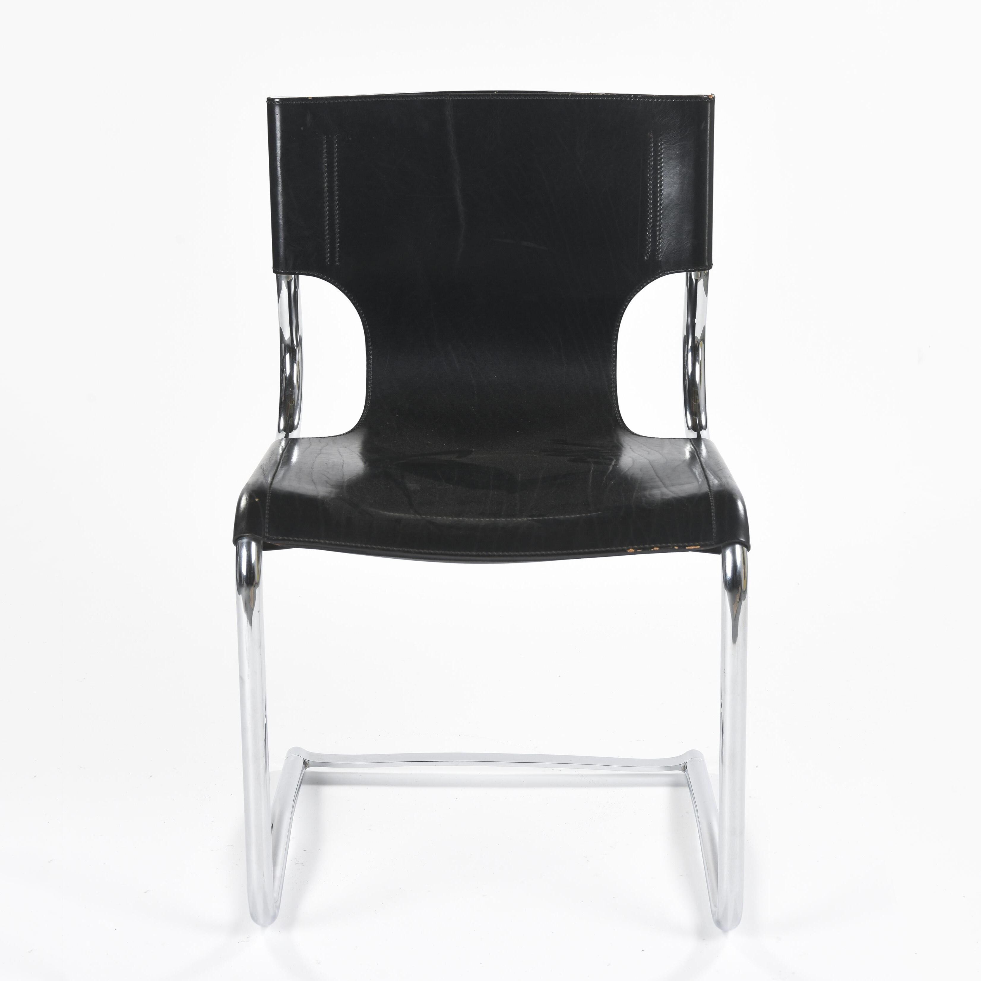 Black leather chairs by Carlo Bartoli