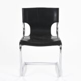Black leather chairs by Carlo Bartoli