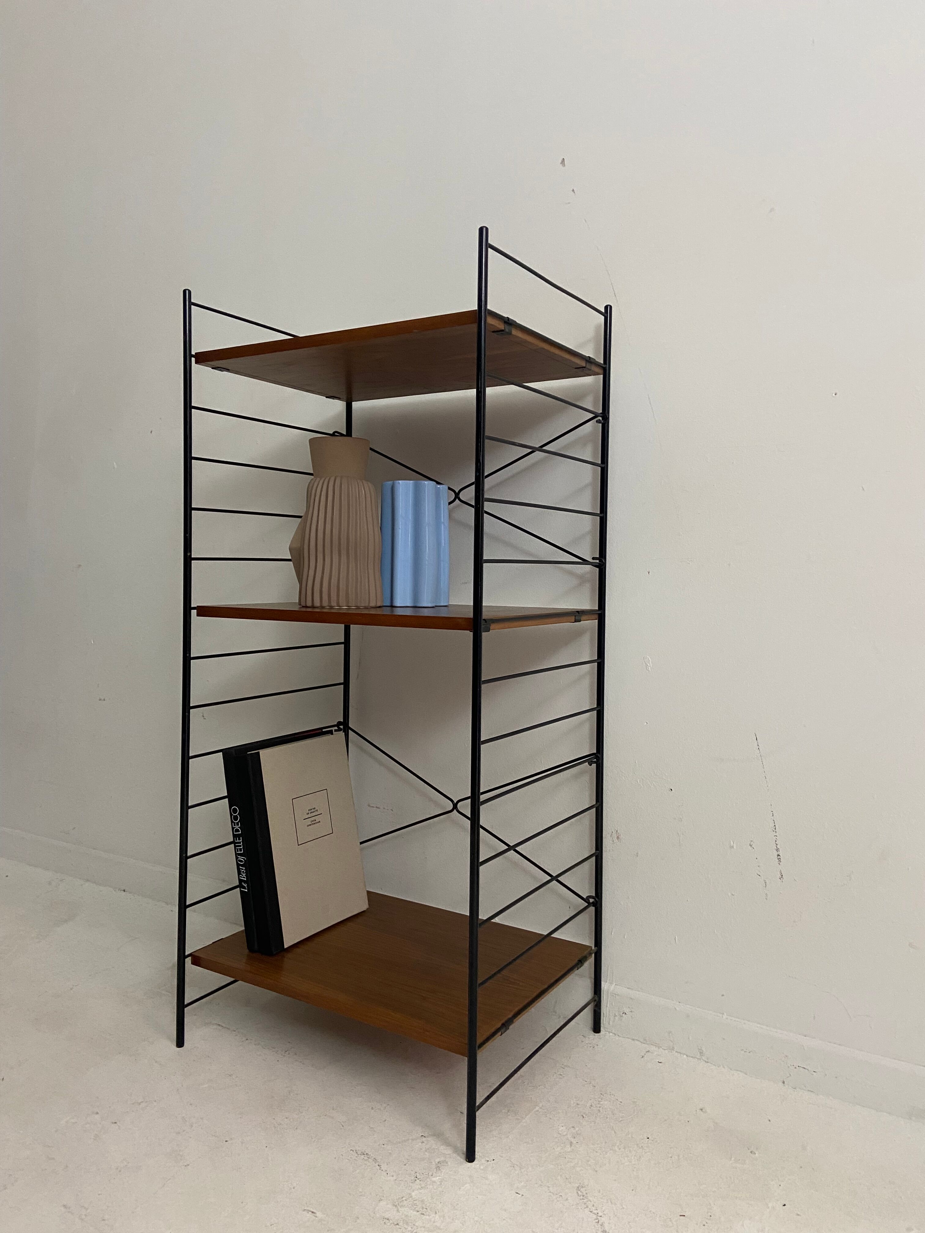 small vintage metal and teak string bookshelf