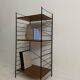 small vintage metal and teak string bookshelf