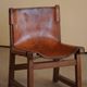 Paco Muñoz, Pair of lounge hunting armchairs, model "Riaza", leather and walnut, 1960