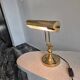 Vintage gold Art Deco banker lamp