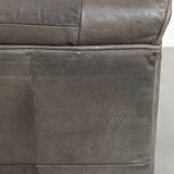 Gray leather design element/ armchair from the 70s + footstool