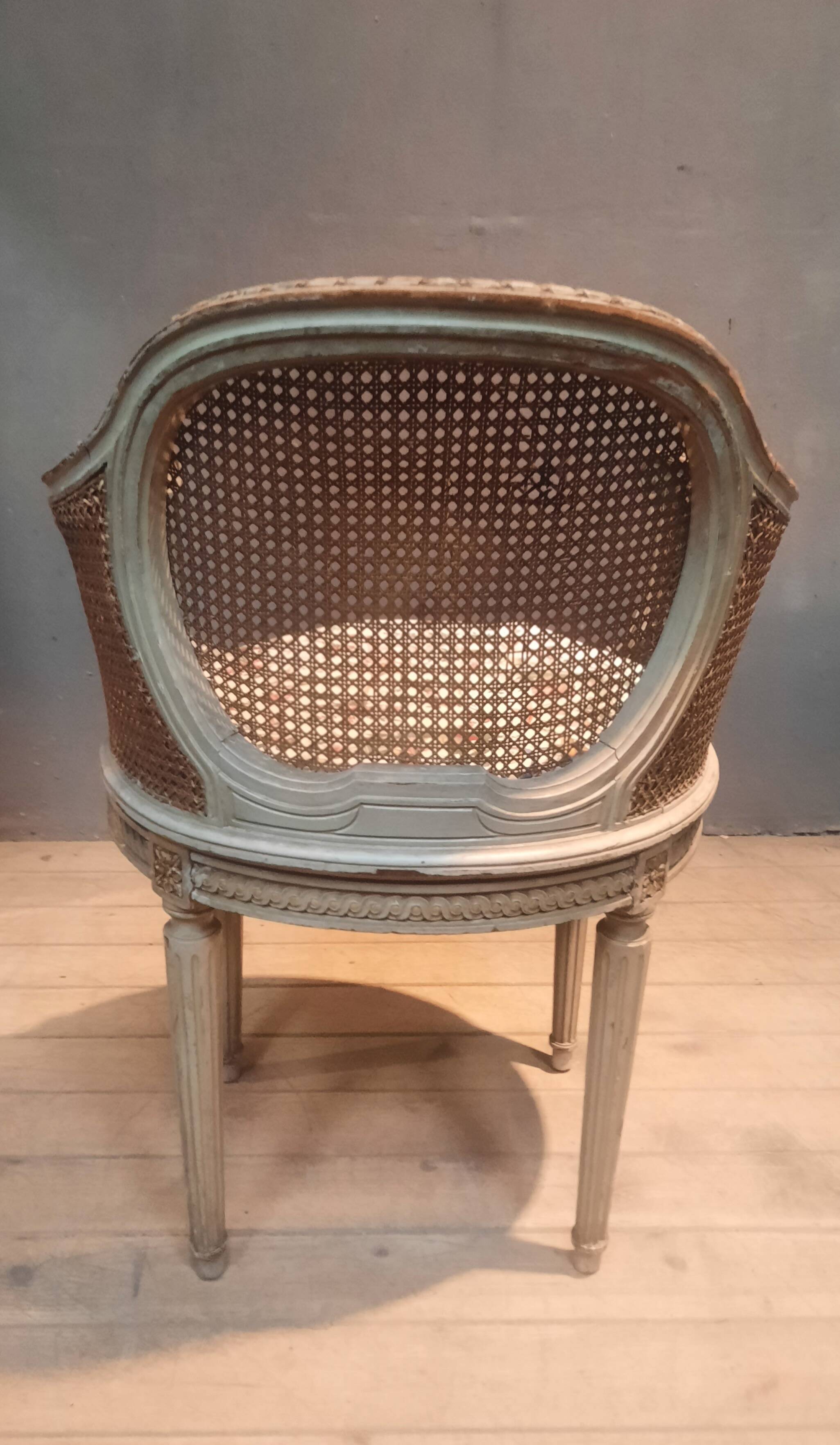 Caned armchair in Louis XVI style