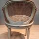 Caned armchair in Louis XVI style