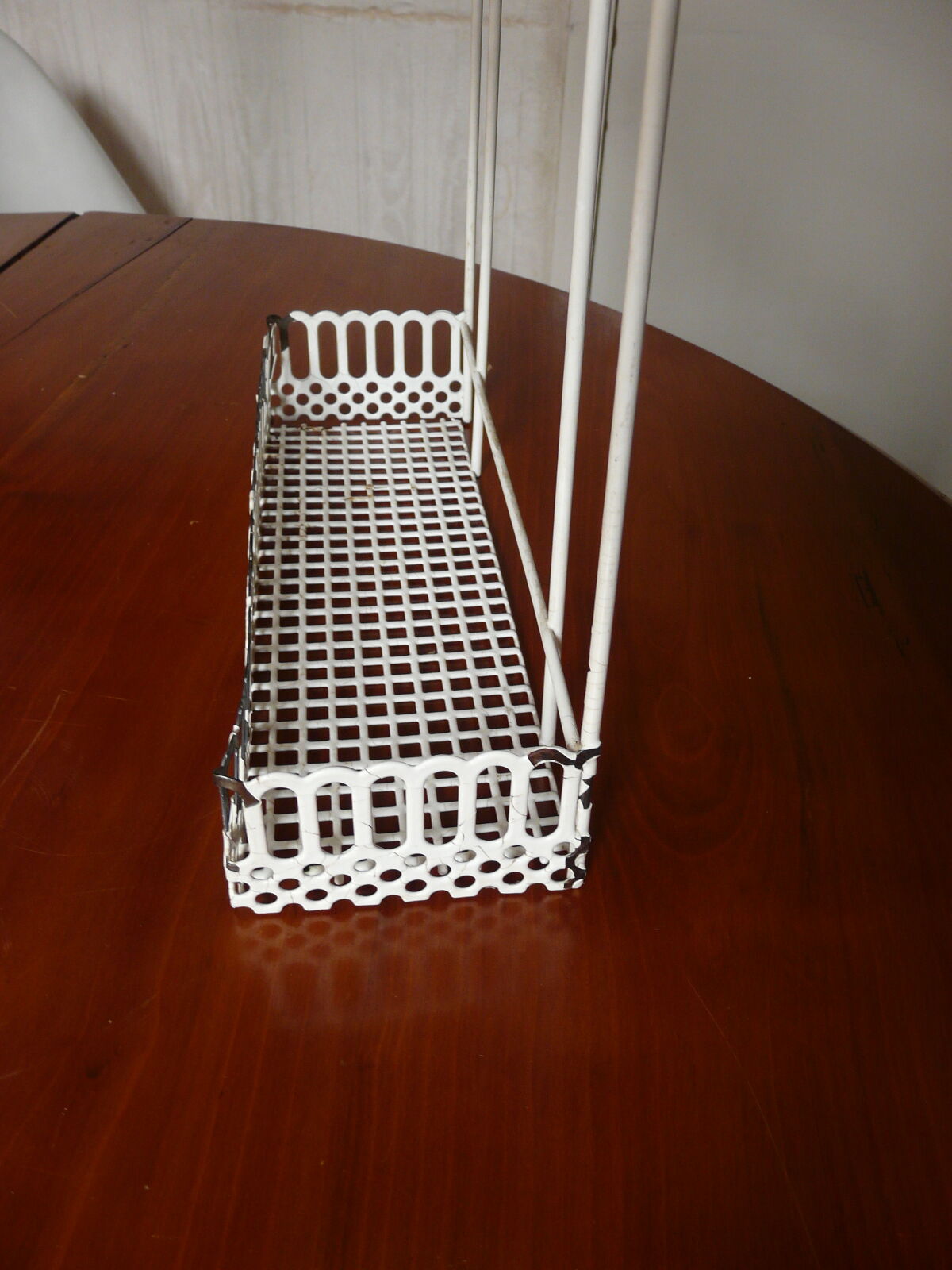 Perforated metal shelf