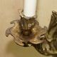 Pair of antique wall sconces from the 1920s in gilded bronze.