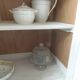 Small vintage piece of furniture sublimated in a linen shade, wooden top.