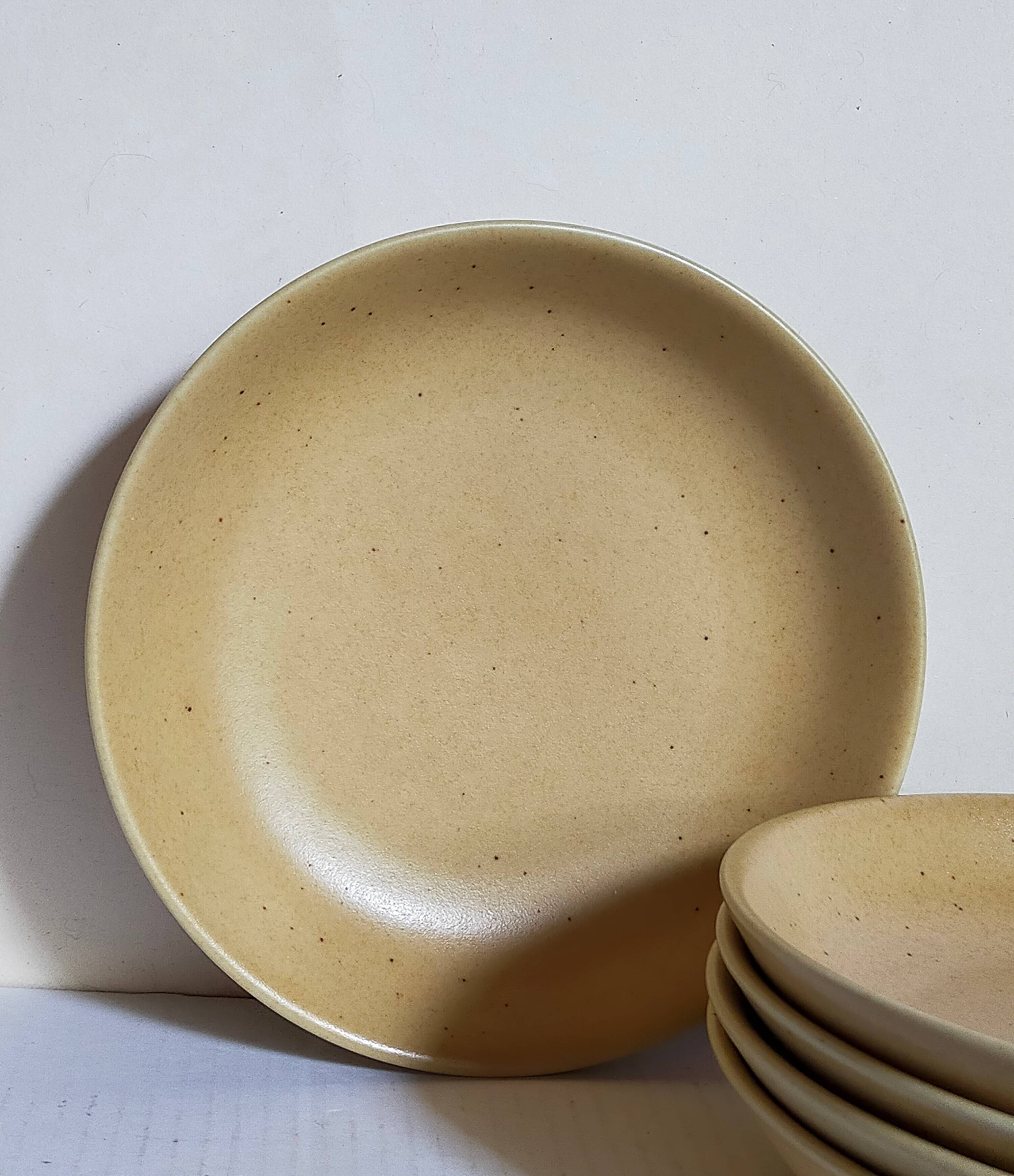 Five vintage natural stoneware soup plates