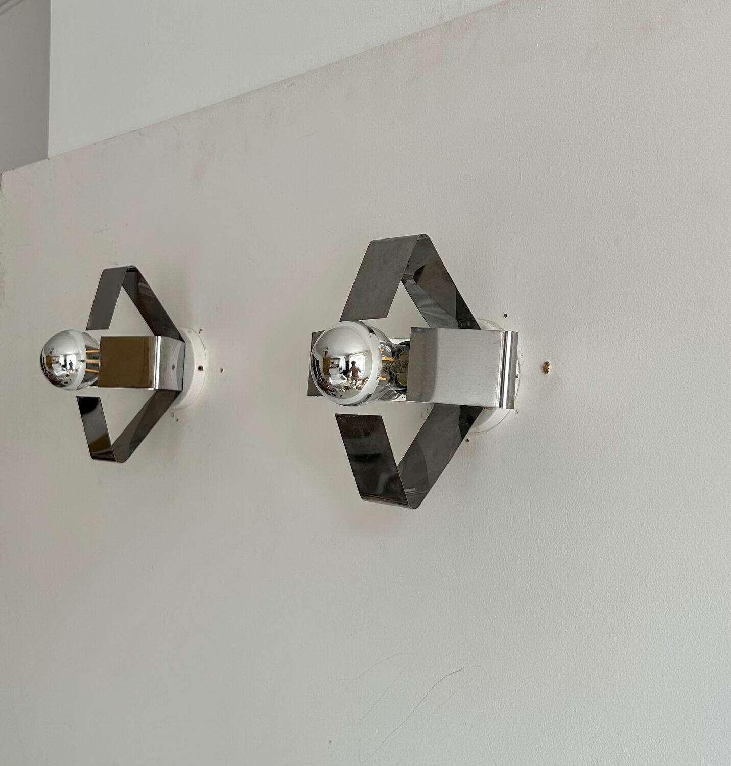 Pair of wall lamps in chromed metal France 1970