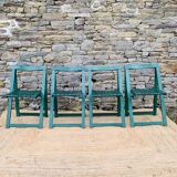 Set of 4 green folding chairs