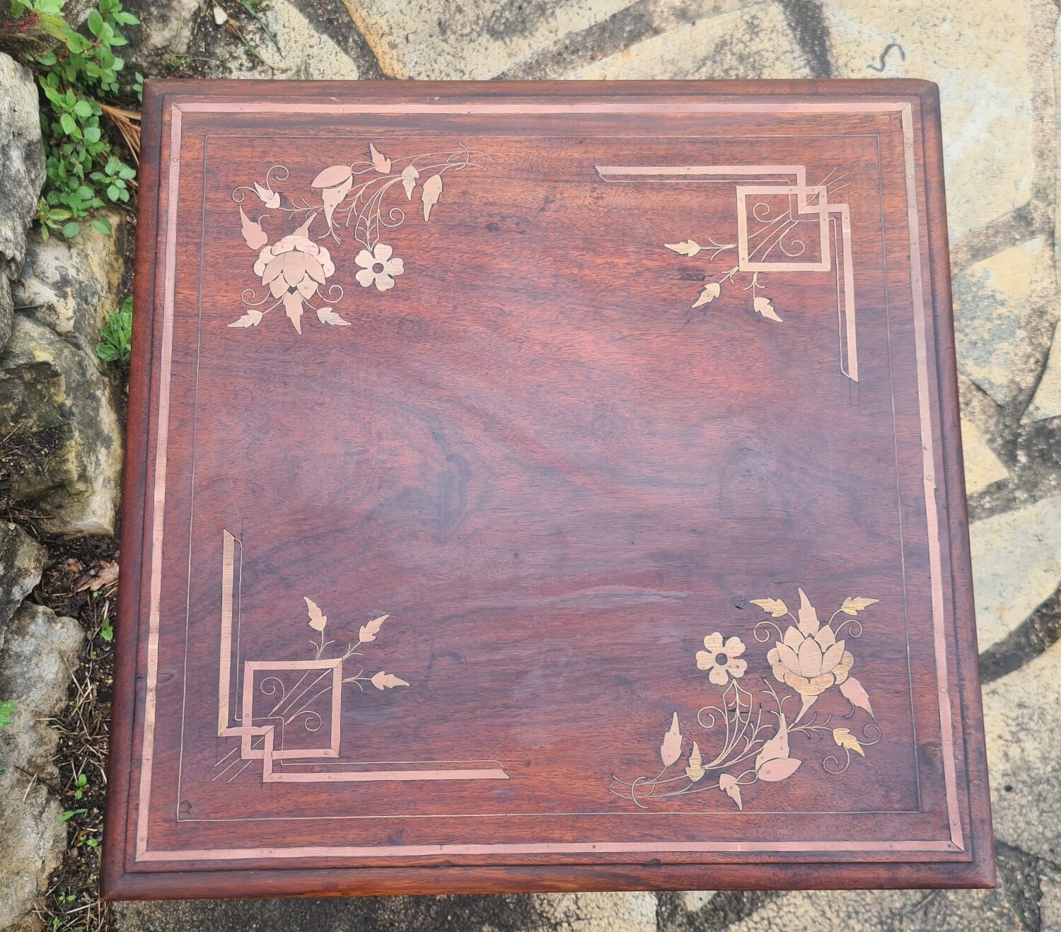 Coffee table in brass marquetry