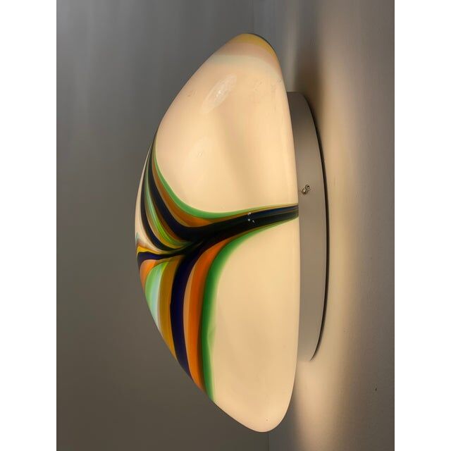 Pair of wall sconces in Murano glass