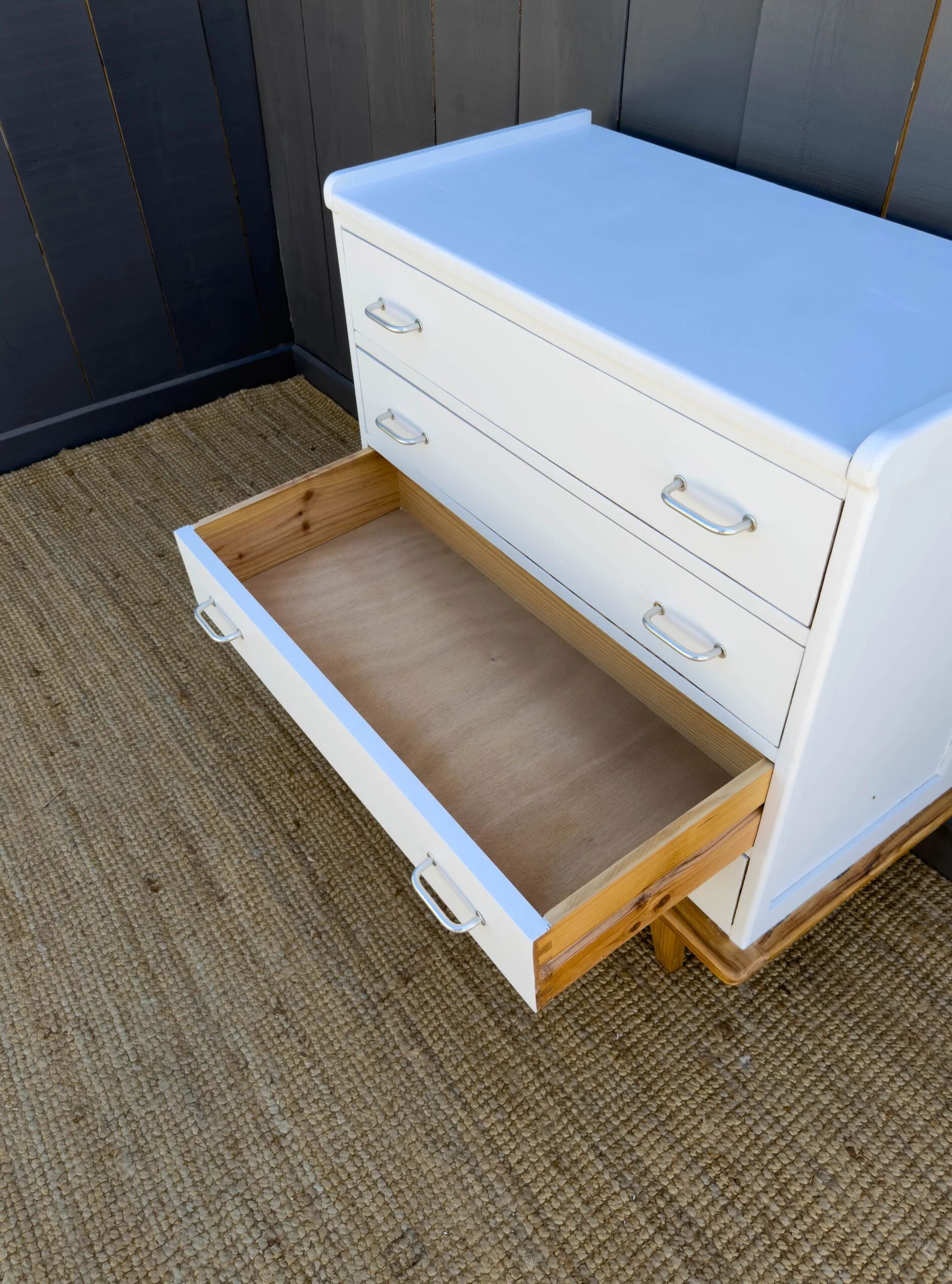 Compass leg chest of drawers