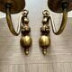 Pair of vintage wall sconces in brass and frosted engraved glass.