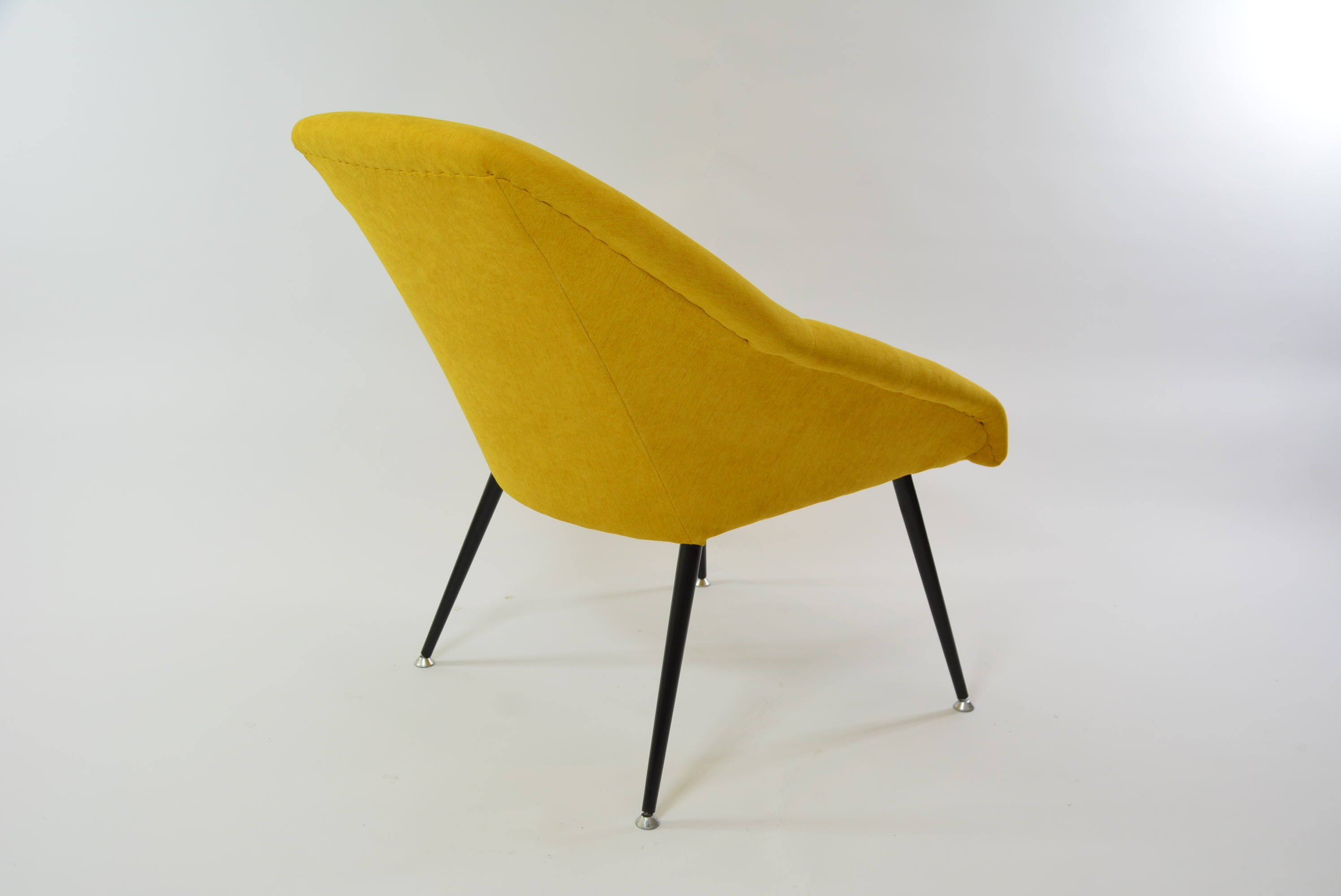 Yellow shell armchair