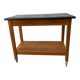 Vintage wooden high table on wheels