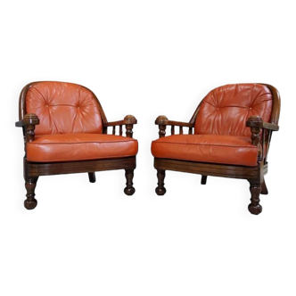 Pair of 60s armchairs in leather and wood