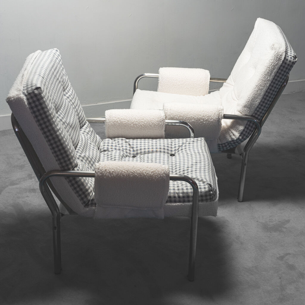 Pair of tubular armchairs double face '70