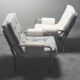 Pair of tubular armchairs double face '70