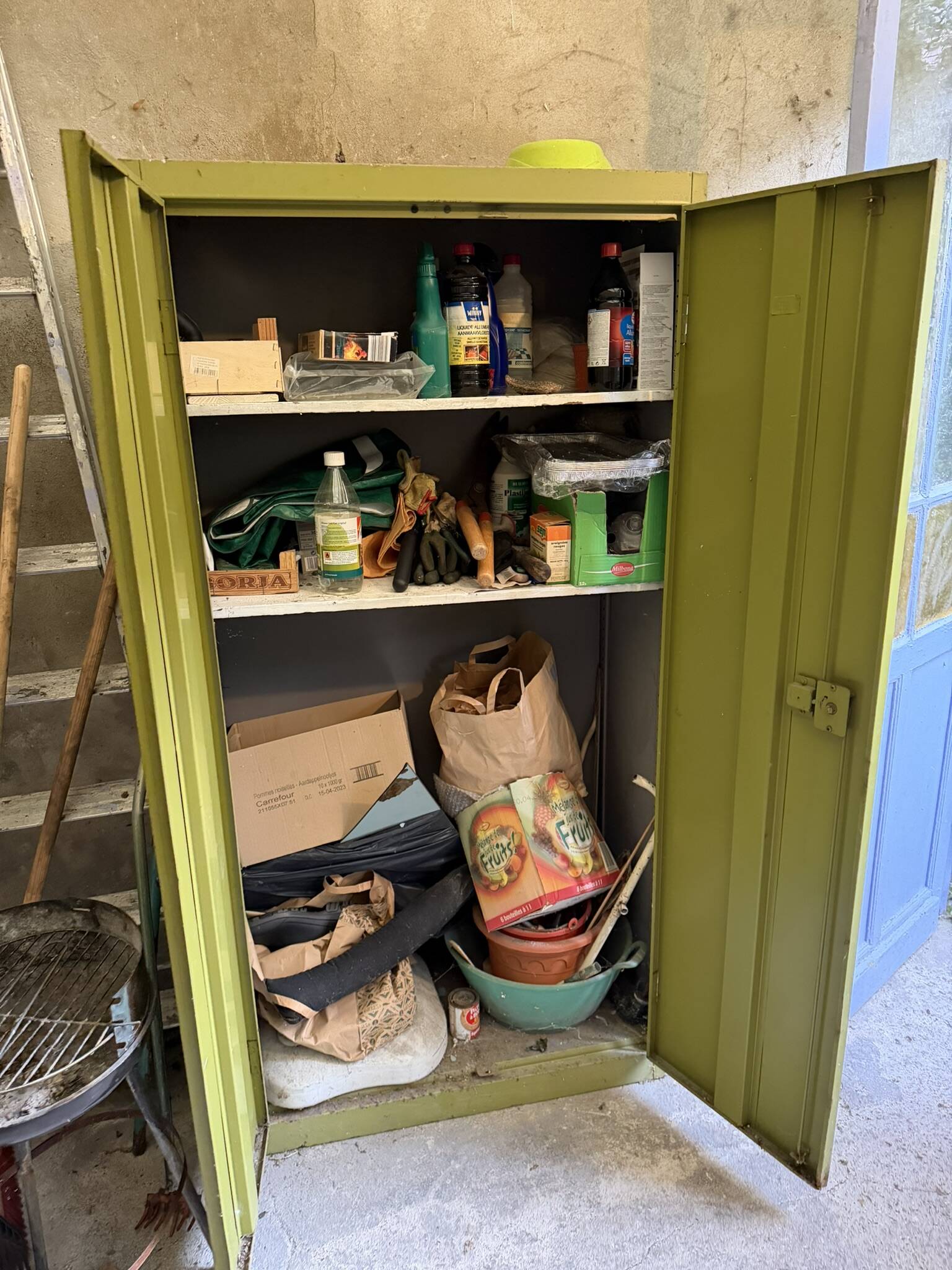 Green metal wardrobe in military style