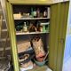 Green metal wardrobe in military style