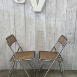 Pair of chrome and cane folding chairs