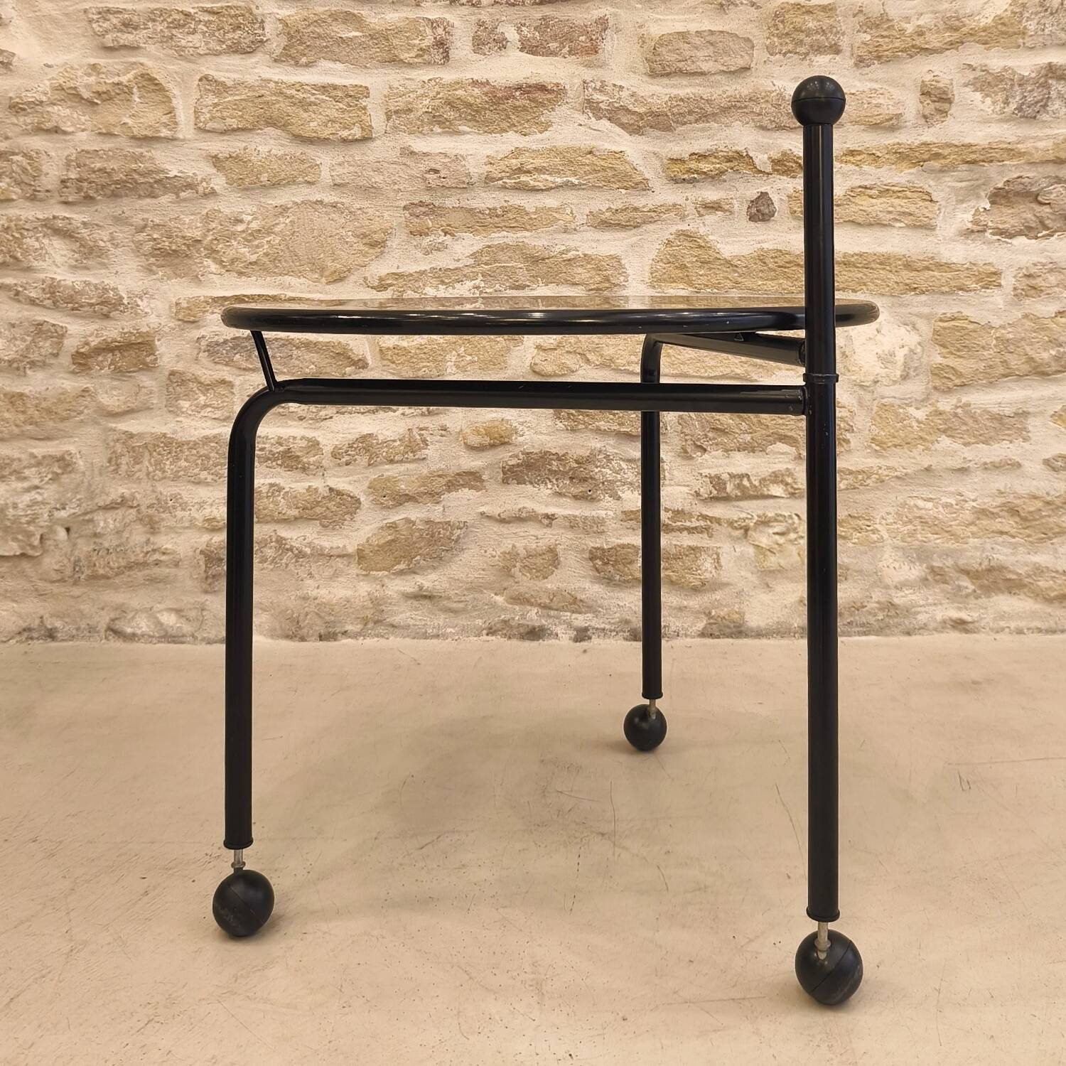 Foldable metal side table, design by Tord Bjorklund, Ikea.