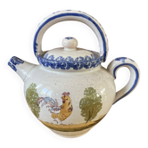Crucible, ancient teapot made of terracotta.
