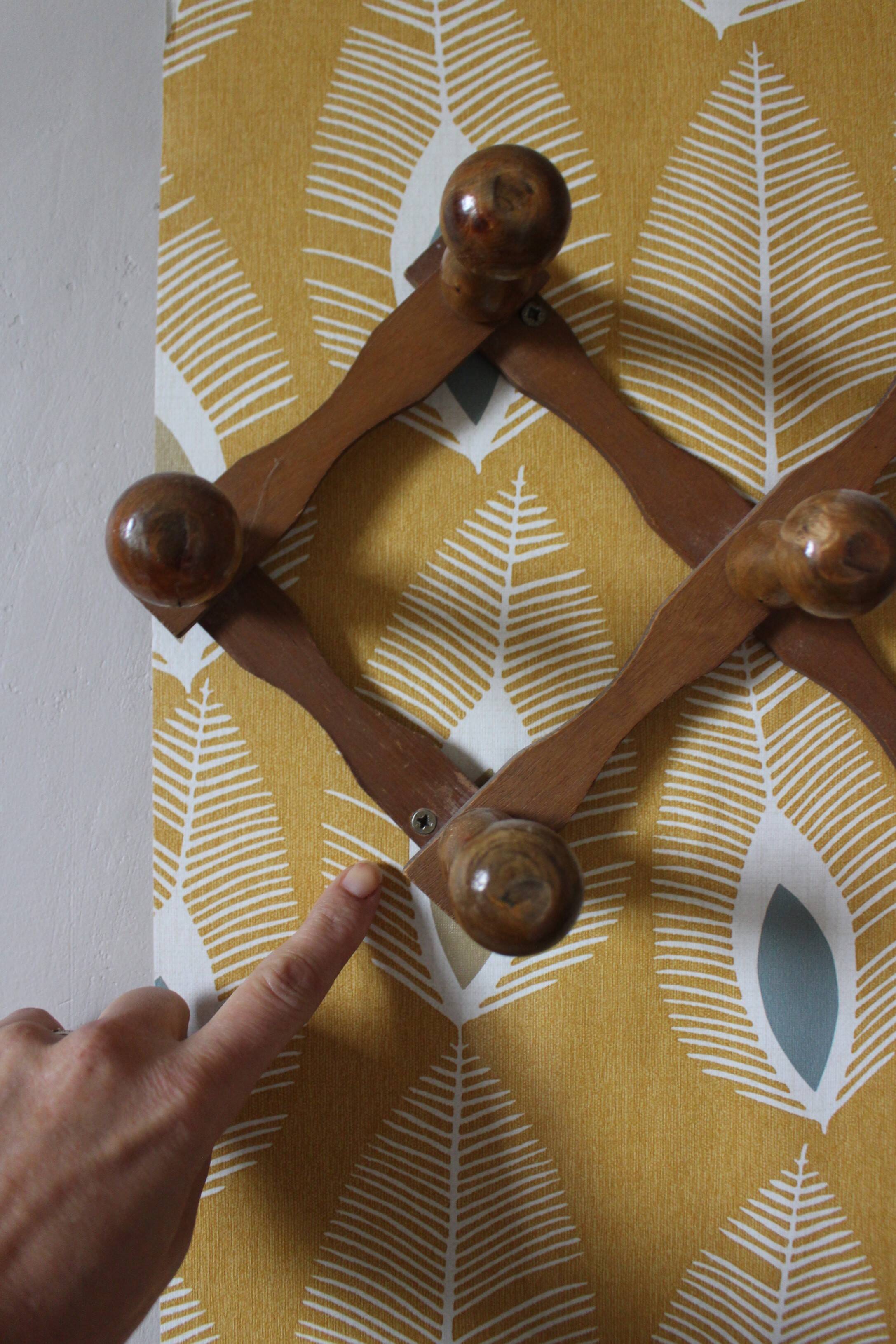 Vintage wooden ball accordion coat rack