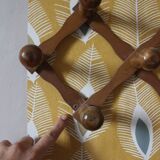 Vintage wooden ball accordion coat rack