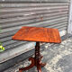19th-century solid mahogany table with a tilting top and brass mechanism.