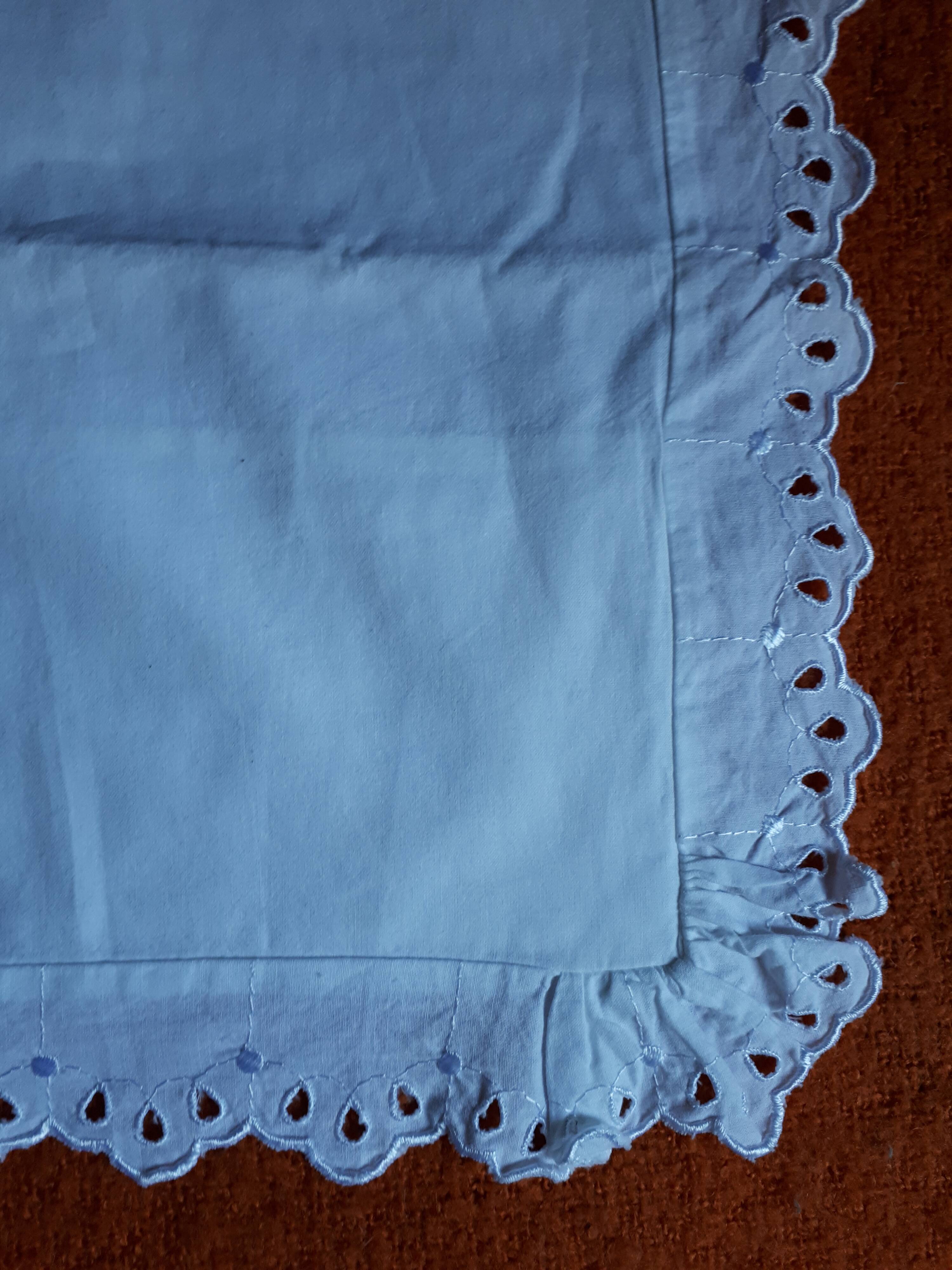 Old pillowcase in white and flying cotton embroidery english