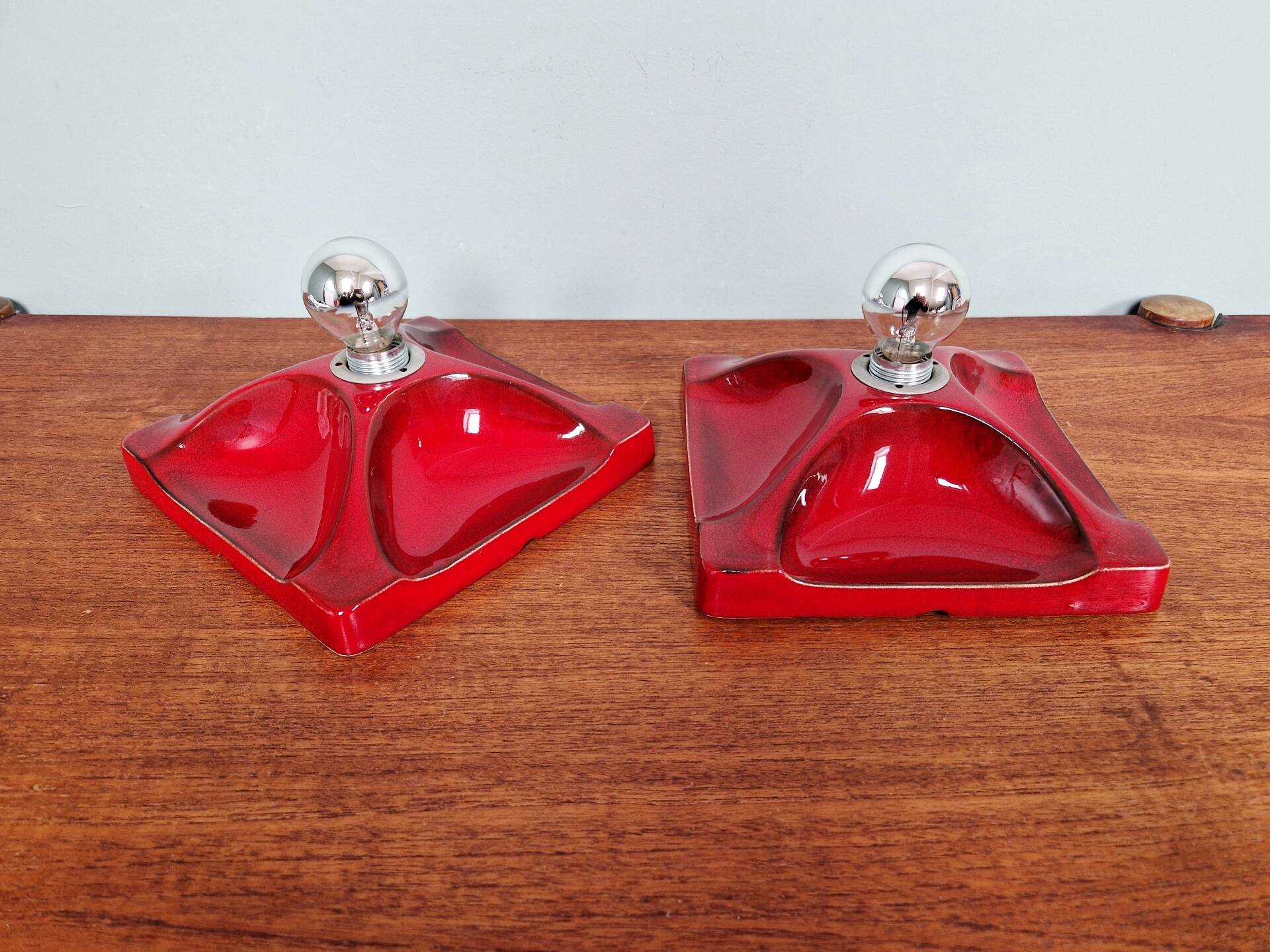 Pair of Space Age wall sconces in red ceramic, 1970.