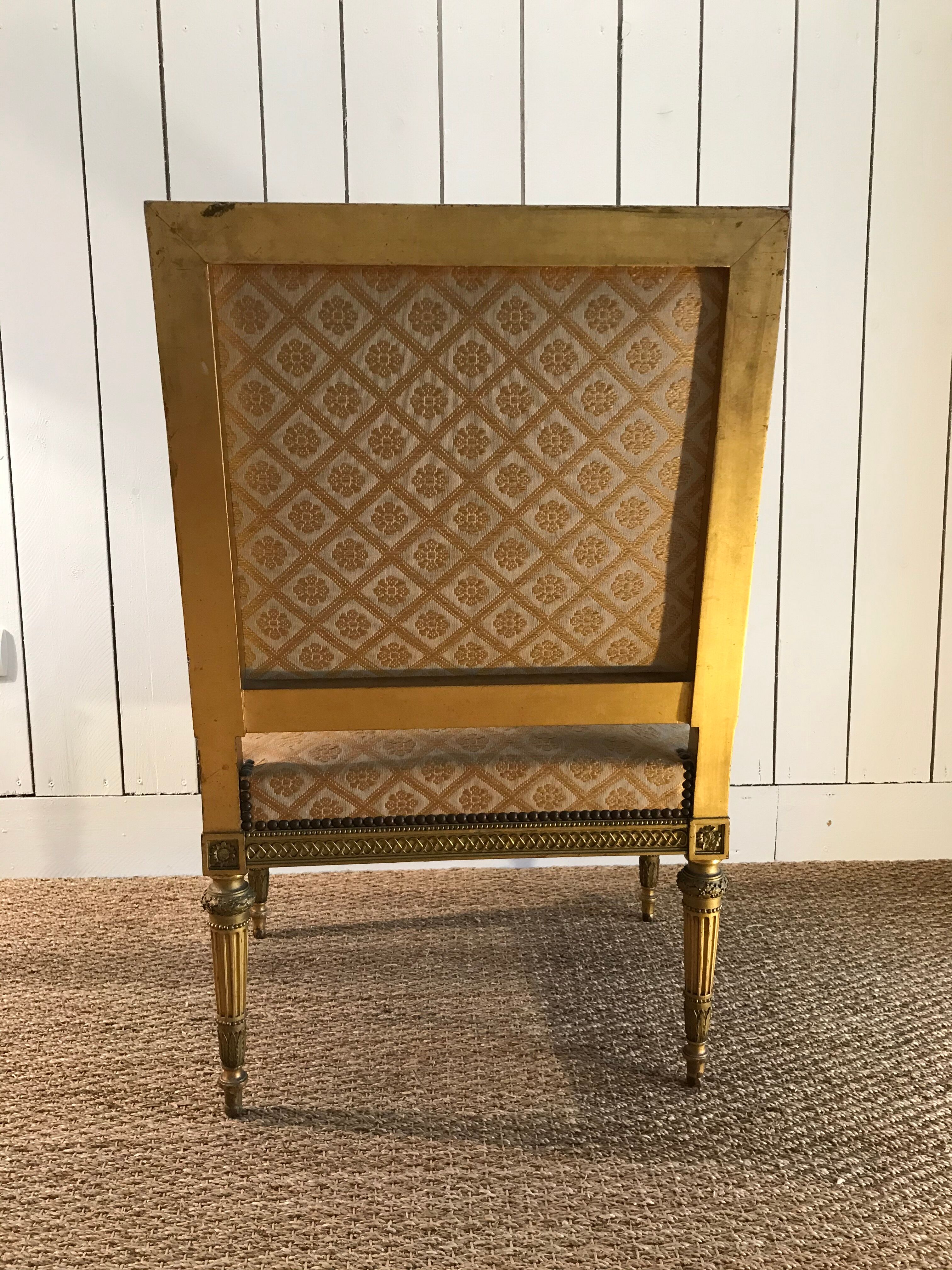 Louis XVI armchair in gilded wood carved and molded