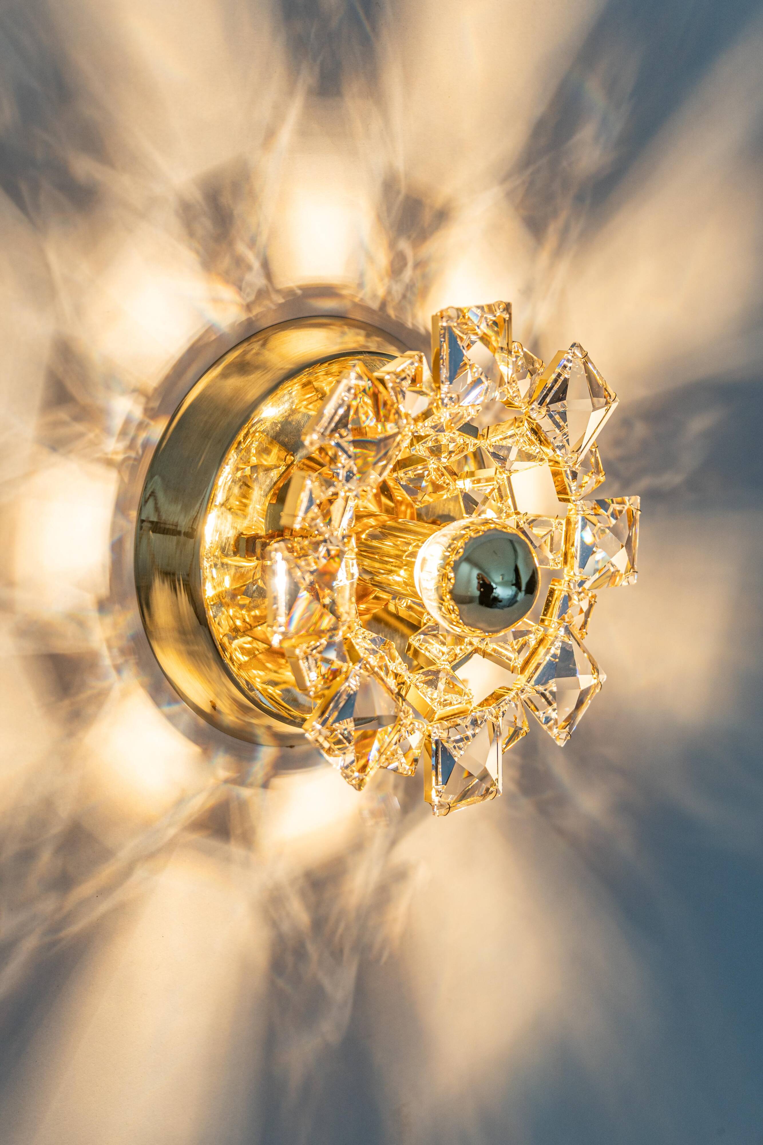 Pair of wall sconces in gilded crystal by Palwa, Germany, 1960s.