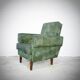 Green armchair in leatherette