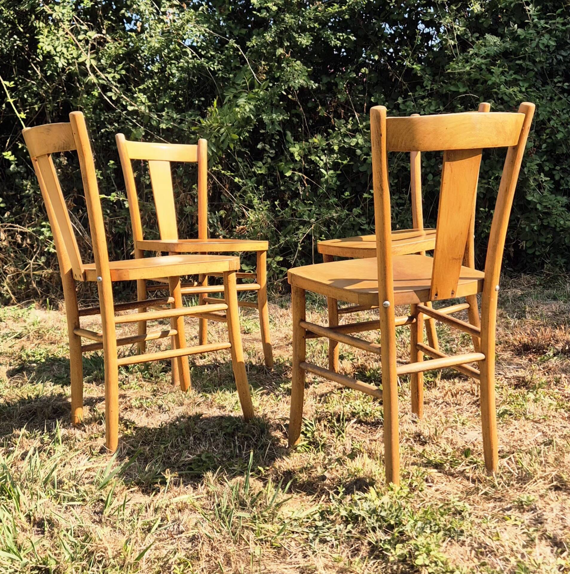 4 vintage bistro chairs from the 1950s in raw wood