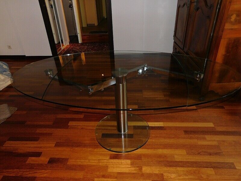 Glass and stainless steel dining table with 2-length system