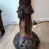 Ceramic lamp decorated with foliage
