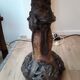 Ceramic lamp decorated with foliage