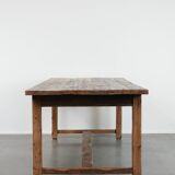 Magnificent and robust antique farmhouse dining table made of pine wood