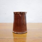 Vintage pitcher in glazed terracotta