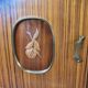 1960s sideboard with decorated doors in wood and brass