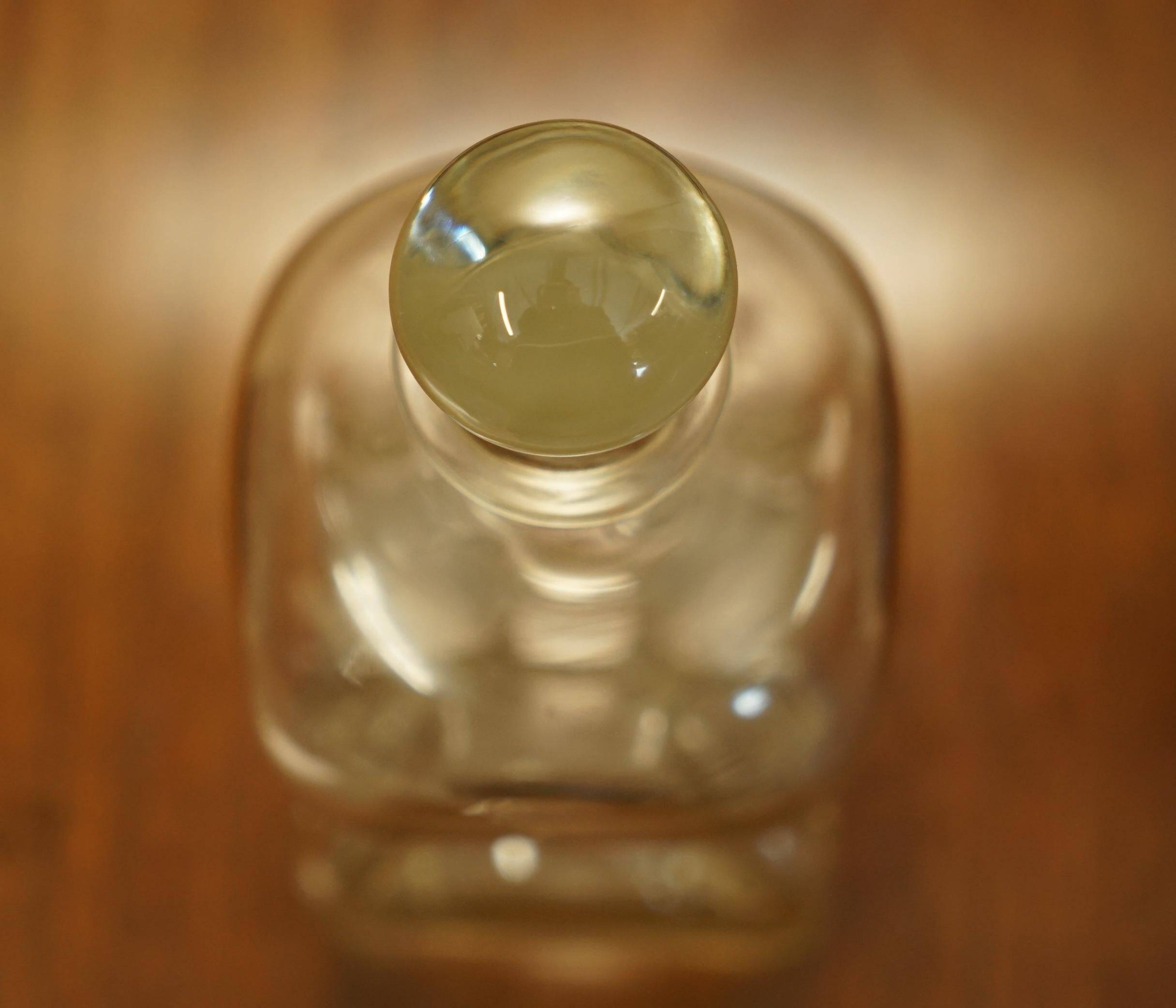 Pair of antique pinched decanters circa 1900 for serving whisky, bourbon, vodka, gin.