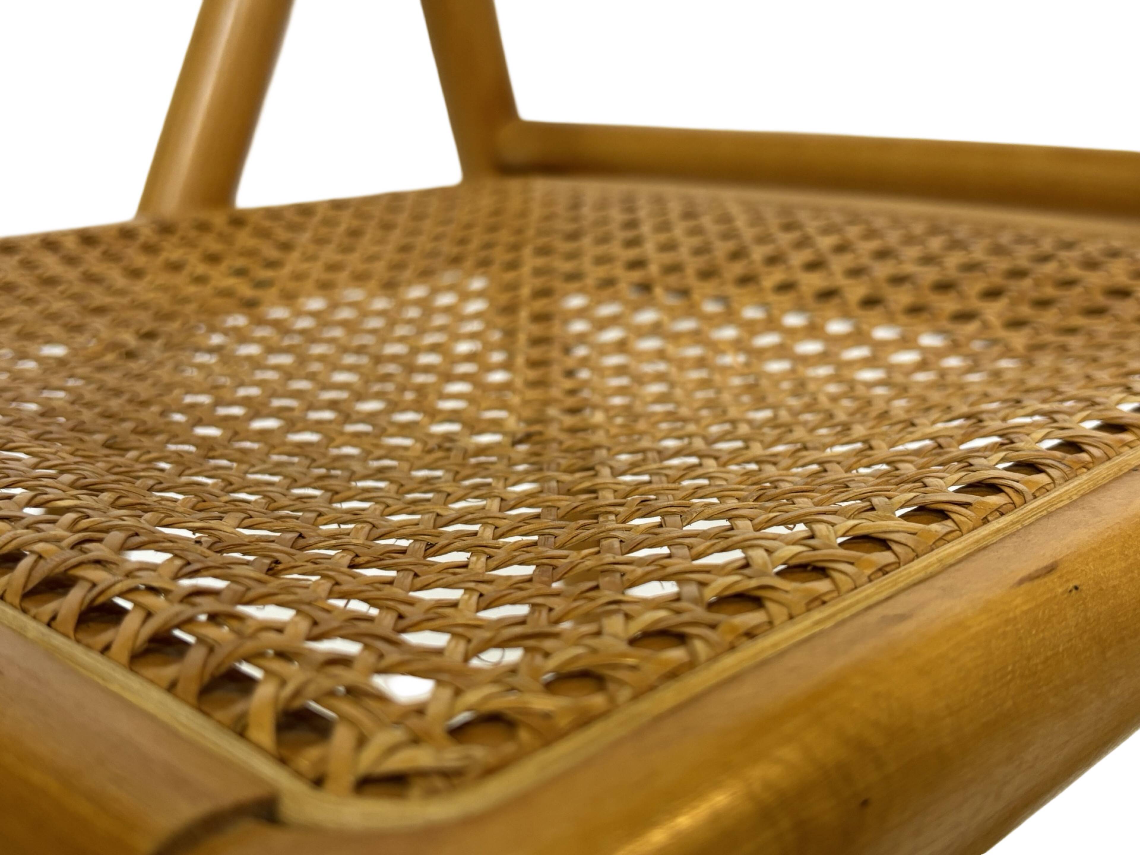 Vintage wooden folding chair with rattan seat 80s minimalist design