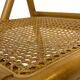 Chaise pliante vintage en bois avec assise en rotin design minimaliste des années 80