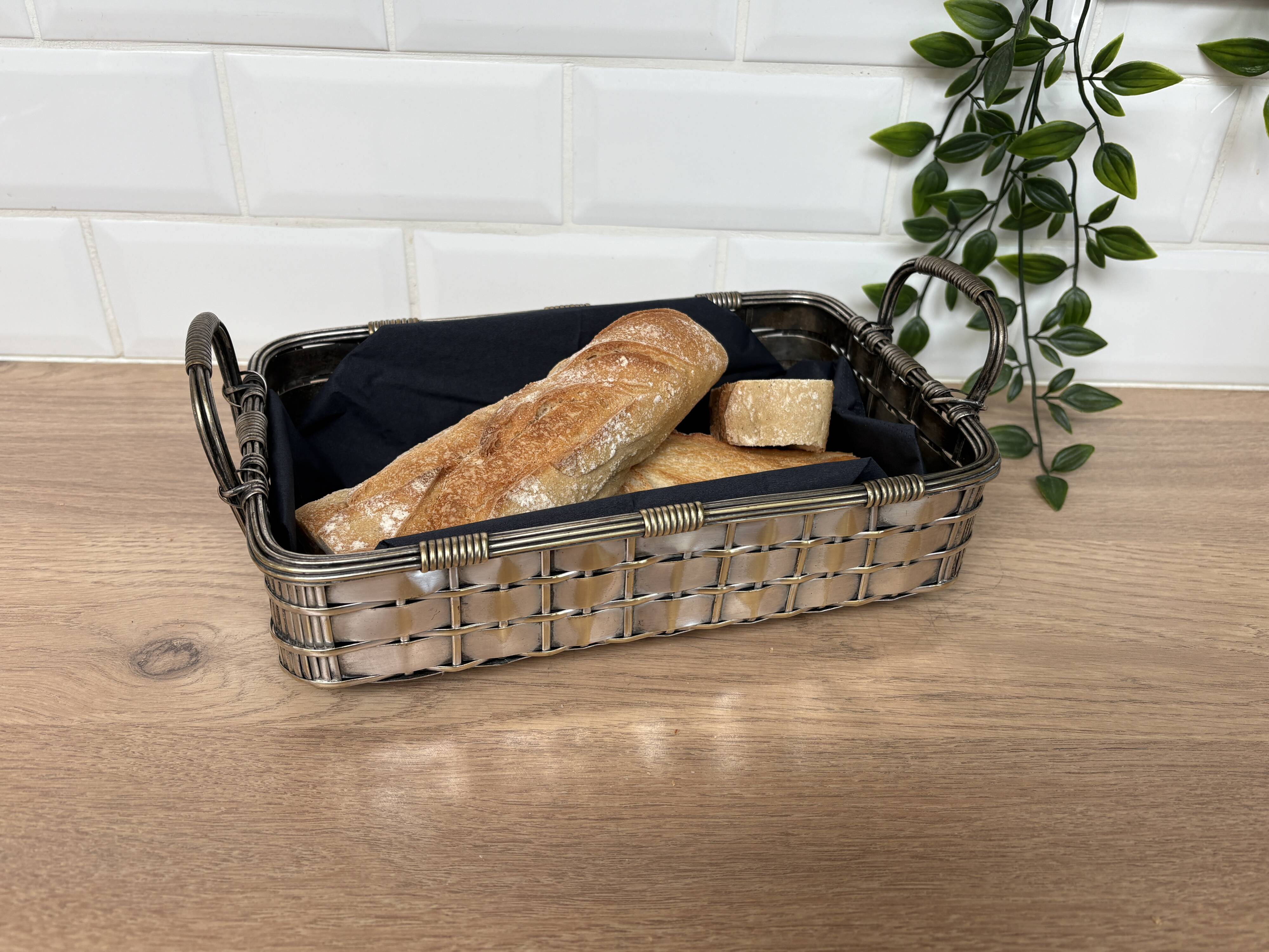 Woven silver-plated metal basket.
