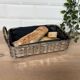 Woven silver-plated metal basket.